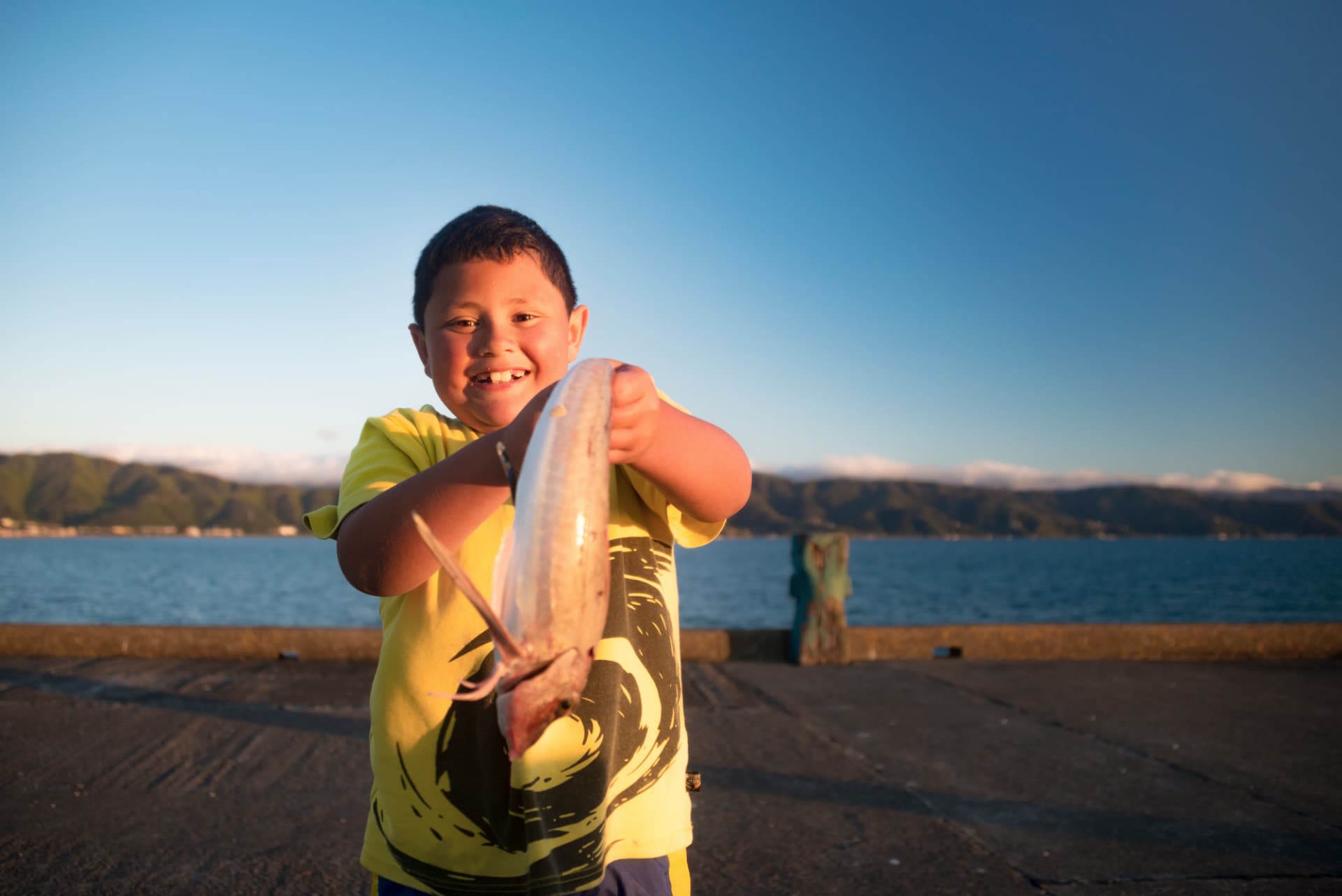 Kid with fish credit Dave Allen NIWA